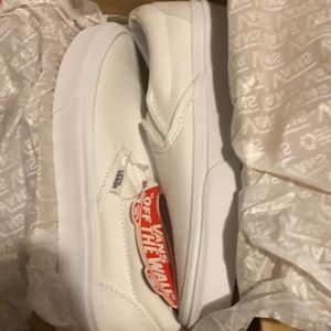 White slip on vans